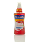 A bottle of Chloraseptic cherry flavor sits on a counter top.