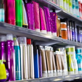 Hair gel and hair products on a store self.