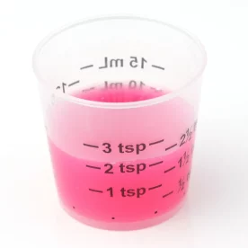 Pink liquid medicine that looks like Pepto Bismol