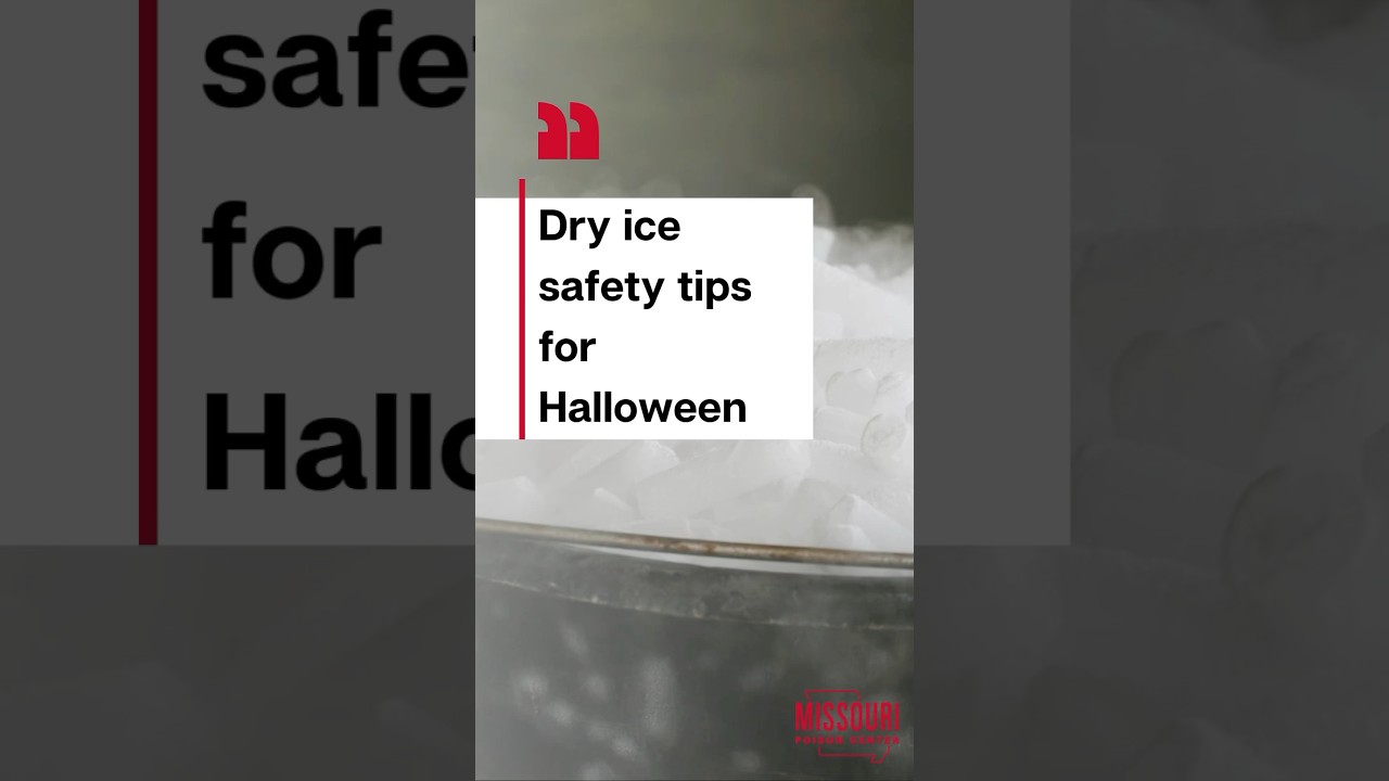 Metal bucket full of dry ice chunks over a black background