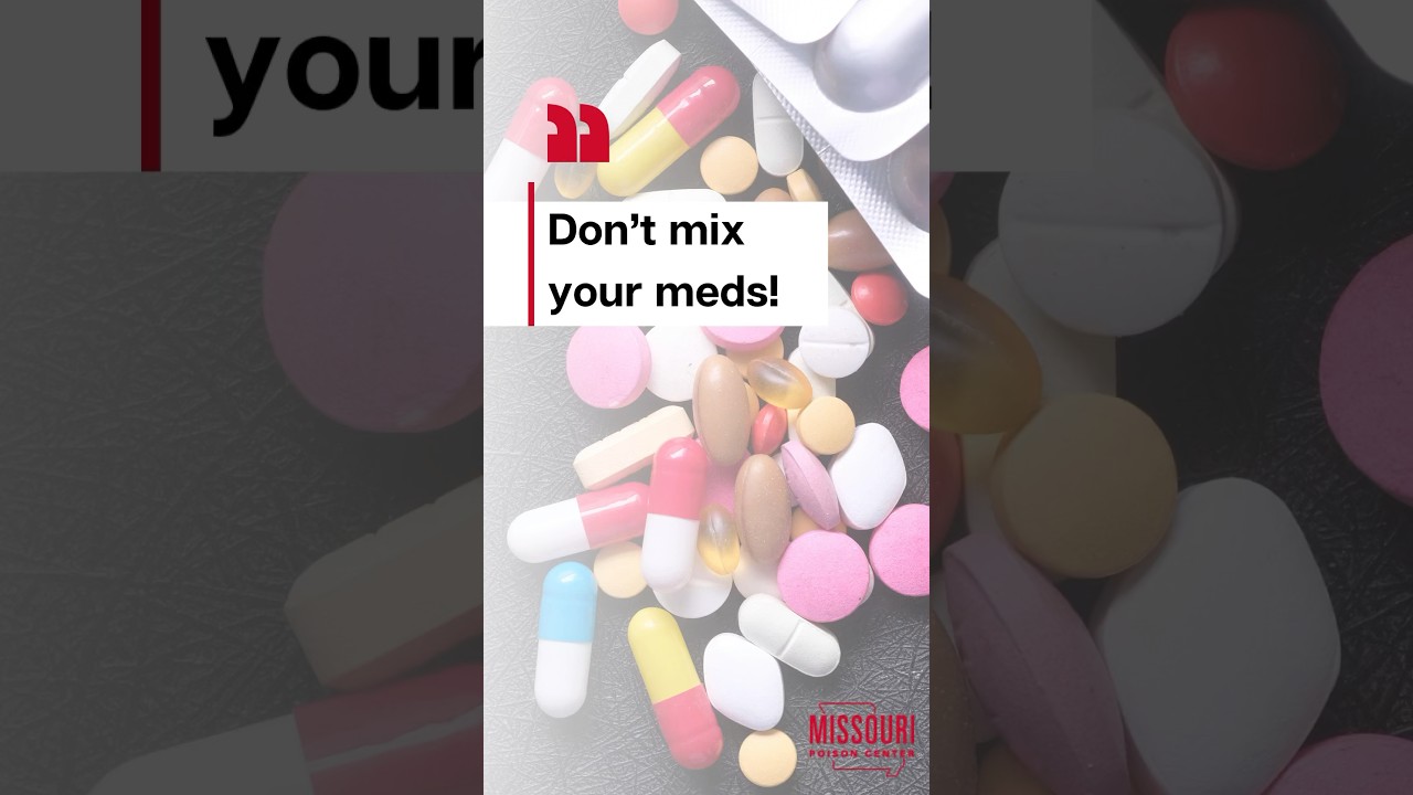 A lot of different colored pills scattered over a black table
