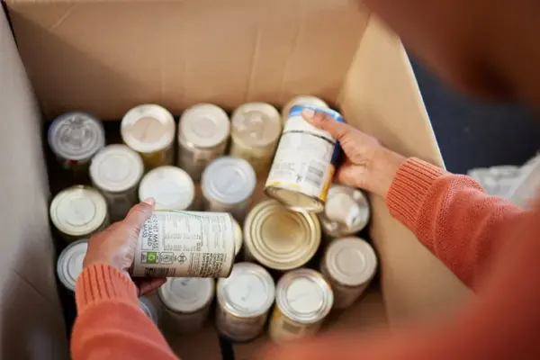 A box of canned foods, which often contain disodium EDTA as an ingredient.